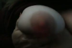 Mature neighbor playing with large firm teats intensively