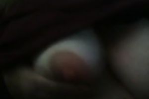 Mature neighbor playing with large firm teats intensively