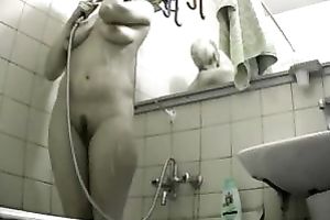 Sweet looking honey had no idea that I was spying on her in the bathroom