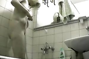 Sweet looking honey had no idea that I was spying on her in the bathroom