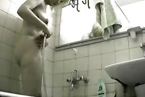 Sweet looking honey had no idea that I was spying on her in the bathroom