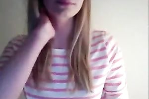 Cute blonde haired girlie pulled up her T-shirt to show me her constricted bra buddies
