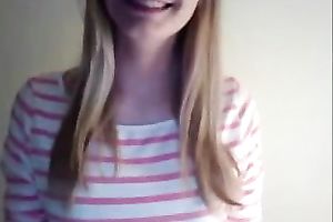 Cute blonde haired girlie pulled up her T-shirt to show me her constricted bra buddies