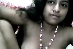 Lewd non-professional Indian nympho with biggest boobies smiles for me on livecam