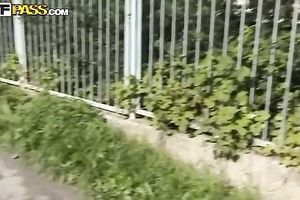 Comely Russian legal age teenager Krystinka exposes her butt and titties outdoors