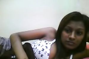 Short haired dilettante Desi brunette hair disrobes not fast to show boobies