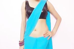 Curvaceous Indian woman teaches how to drape saree