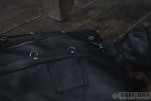 This leather sleep sack is very taut on slave's body