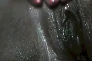 Super dark hottie rubs her juicy and itchy fanny by her fingers