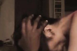 Dark haired slender wench of my buddy gives him a terrific oral stimulation