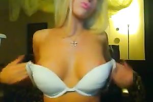 Mind blowing golden-haired seductress shows off her consummate titties