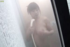 It was a window into the bathroom that allowed us to spy on this breasty honey