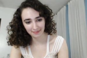 Curly haired appetizing sweetheart showed off her mesmerizing breasts