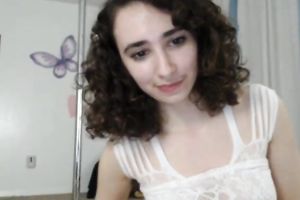 Curly haired appetizing sweetheart showed off her mesmerizing breasts