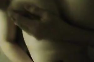 Busty and thick white white bitch in couch in solo masturbation act