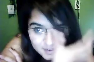 Cute nerdy dark brown copulates herself with a sex toy on livecam