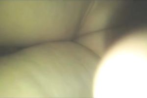 Super sexy woman in constricted suit has an ass to be proud of