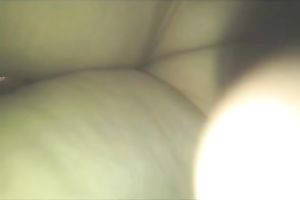 Super sexy woman in constricted suit has an ass to be proud of