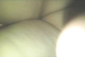 Super sexy woman in constricted suit has an ass to be proud of