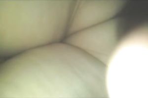 Super sexy woman in constricted suit has an ass to be proud of