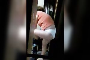 Hidden camera tapes polish nurse dressing up for work