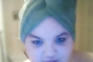 Young white big beautiful woman floozy in the shower flashes her body