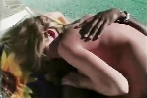 Elegant golden-haired temptress goes for a ride on a cheeky educate outdoors