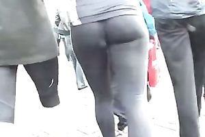 Following hawt playgirl with admirable gazoo cheeks wearing tight leggings