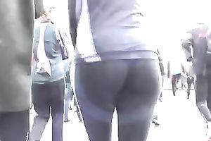 Following hawt playgirl with admirable gazoo cheeks wearing tight leggings