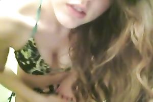 Busty gorgeous legal age teenager passionately masturbates on livecam