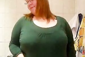 Fat redhead aged housewife is proud of her large boobies