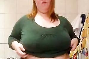 Fat redhead aged housewife is proud of her large boobies