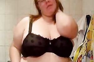 Fat redhead aged housewife is proud of her large boobies