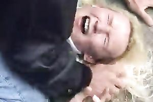 Cruel villain teases and rapes a sexy blonde in the backyard
