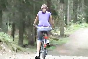 Sexy young wife bicyclist gets raped in a forest by a horny skunk