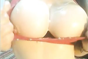 Hot tempered Hispanic livecam model is showing off her large love bubbles