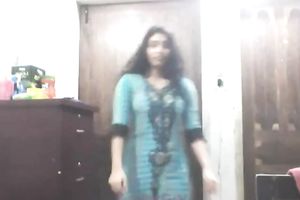 Cute lengthy haired Indian gal shows off in her bright saris