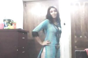 Cute lengthy haired Indian gal shows off in her bright saris