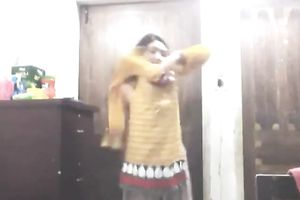 Cute lengthy haired Indian gal shows off in her bright saris