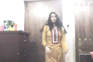 Cute lengthy haired Indian gal shows off in her bright saris