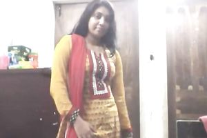 Cute lengthy haired Indian gal shows off in her bright saris