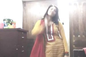 Cute lengthy haired Indian gal shows off in her bright saris