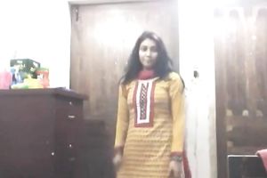 Cute lengthy haired Indian gal shows off in her bright saris