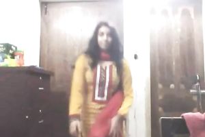 Cute lengthy haired Indian gal shows off in her bright saris