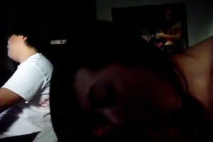 Asian non-professional wench was engulfing weenie in the dirty room on webcam