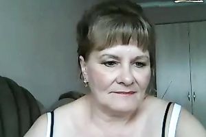 Shameless granny is using a banana as a sex tool for my viewing joy