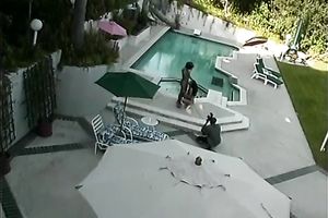 Large dark rod for 2 perverted and lascivious honeys in the swimming pool