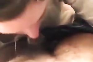 Curly secretary of my buddy works on his large chubby prick with pleasure