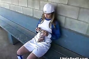 Sizzling hawt and nice-looking blond college girl in baseball uniform