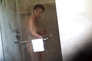 Fat short haired older white women going out of shower room